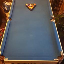 4ft 7" x 2ft 6 " . FOLDS AWAY . NO CUES . BALLS AND TRIANGLE INCLUDED . CAN DELIVER LOCALLY
