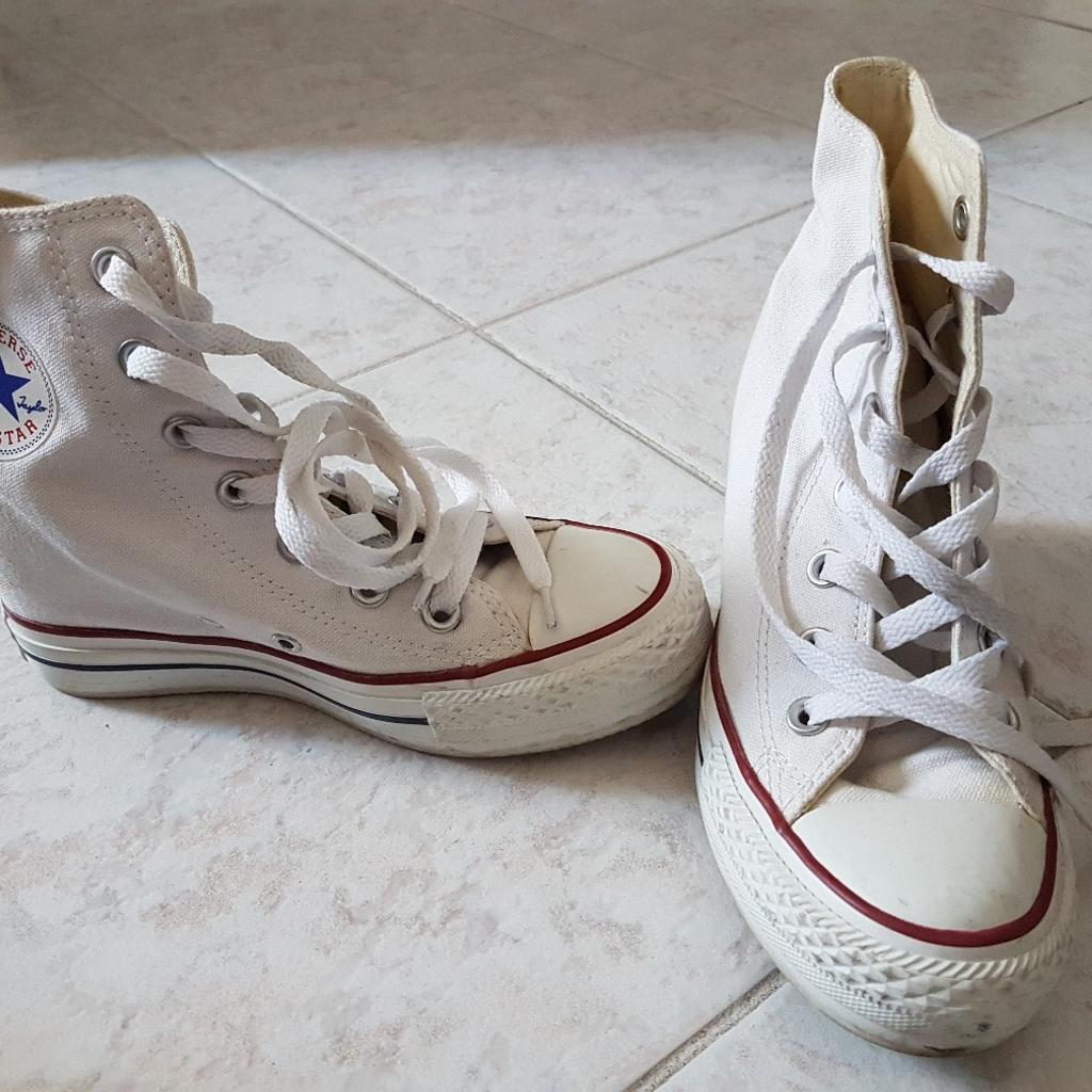 Converse bianche shop con zeppa interna