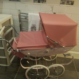 hi i am selling my daughters silvercross coach built pram hardly i
used the wheels just need some trainer whitner on then will look fab i paid nearly £400  for this but she asnt bothered with it xx