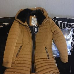 Brand new size 10-12 mustard bubble coat winter warm coat with fur collar and hood still got tags on