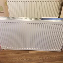 Brand new radiator with wall brackets, 900mm wide by 500mm high, I got the wrong size