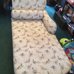 Reluctantly selling this beautiful sturdy chaise, has lovely pheasant design on very hard wearing upholstery, legs are turned wood on castors which are immaculate although one socket is damaged but doesn’t affect the leg slotting in ( if you are a handy man this can be fixed) Length is 69in ,width 29in ,height to main cushion 19in ,and height to top of back rest is 34in comes complete with bolster cushion. New these are over £1000 , bargain selling for £300 would fit in estate car for collectin