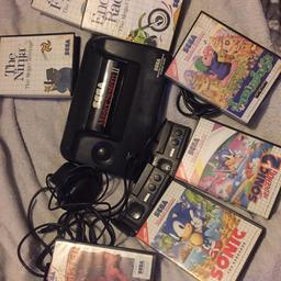 Master system 2 with loads of games :) 

All in good working order