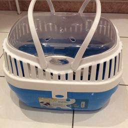 This pet carrier is ideal for small rodents or guinea pigs for transportation or for keeping in whilst cleaning out there cages , have also left in a small water bottle , food bowl and water bowl. Good condition.