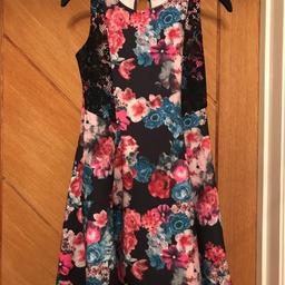 Age 9-10yrs girls flowered sleeveless dress. Excellent condition