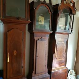 3 long case/ grandfather clocks.
need restoration. 
Most parts are there.