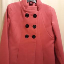 ladys cerise coat brand new never worn size 14 great Christmas present double breasted
collection only