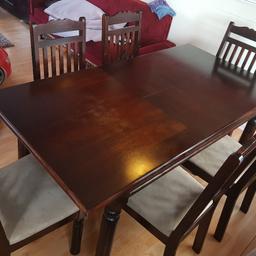 solid wood table that extends with x6 chairs in very good condition. Few minor scratches. swade material on chair bottoms. pick up only from OLDHAM IN ROYTON. first to see will buy. selling due to moving houses. This is a bargain. £120, no offers.