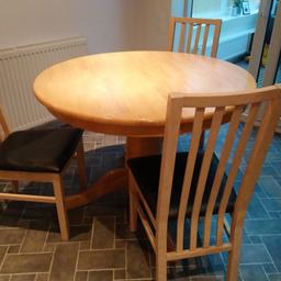 Solid pine round table, extends to comfortably seat six people. Very good condition. Small faded patch as shown on photo. Comes with four chairs. Base removed this morning to allow to be moved. Available to collect from Bishop Auckland.