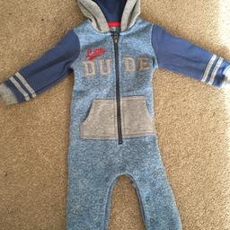 6-9 months all in one zip up hoody suit. Very warm for winter. Worn only a couple of times due to season. Good quality. From a pet and smoke free home.