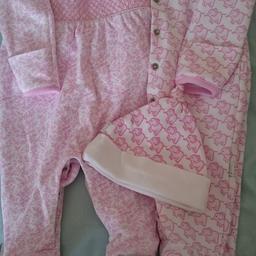 2 Georgeous sleepsuits for a baby girl. These suits have built in scratch mits, and one comes with matching hat. Both suits are in excellent condition and come a smoke free and pet free home.