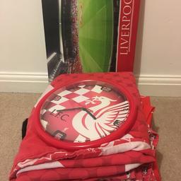 A Liverpool FC Duvet set n curtains. Single set consists of bottom sheet, pillow cases, duvet cover and curtains 66x54. Throw in football mat, clock and canvas