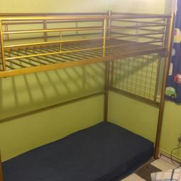 Comes with a table that slots in the space under the top bunk, 2m length. Painted gold, but a bad job.

Collect from Greenford A40.
