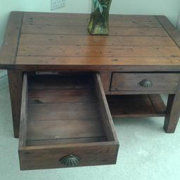 solid wood coffee table. D65 xW120  xH39.5. two Large  Drawers , which peon either side. excellent condition. buyer to collect.