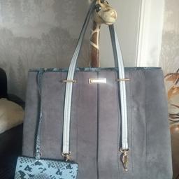Great condition hardly used. Has small snakeskin pouchette attached. fluffy purse has been misplaced sorry. Large tote bag faux dark grey suede front, faux light grey leather back and handle straps (can be altered by clip to make longer) Collection Knuzden BB1 area.