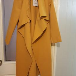 Uk size 8. Medium mustard waterfall duster coat. Brand new. Brought for £30 never worn. still with tags
