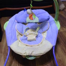 Baby chair suitable from birth. Battery operated. Plays music and vibrates. It has a removable cover which is machine washable. Auto timer switch off after 45 mins. Also has dangly toy with mirror which can be removed or kept on
