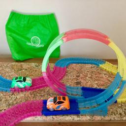 Magic Track Glow In The Dark Plus 2 Cars!
Comes in its own drawstring bag as pictured!
Like New!