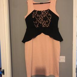 A pale and black dress worn once to a wedding size 18