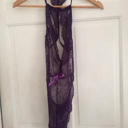 Purple lace body like Victoria Secrets and house off c b
New not been worn size small