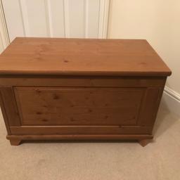 A well built toy chest with a hinge lid that is safe for little fingers.