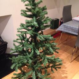Christmas tree in very good condition. 5 feet tall (c. 150cm), c. 80cm wide. In 3 parts, super easy to assemble. Must go by early December.