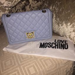 Baby blue moschino handbag bag in perfect condition not a mark on it only weared a couple of times for sale for £50 pond plus 5 postage 