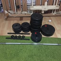 Four 1kg weights, four 1.25kg weights, eleven 2.5kg weights and two 5kg weights. Also includes bars. Good condition barely used!