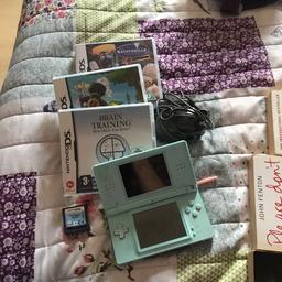 I have 4 games:
Brain training
Zelda
Ratatouille
Flushed away

Ds in used condition but still works fine
Comes with stylus and