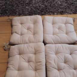 4 material seat pads in cream. Great condition