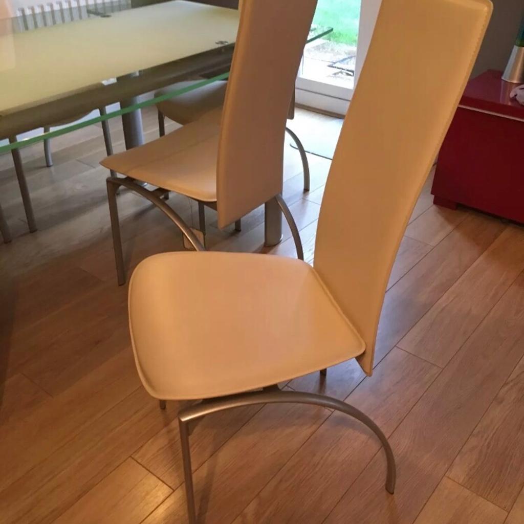 Glass extending dining table +4 leather chair in London Borough of