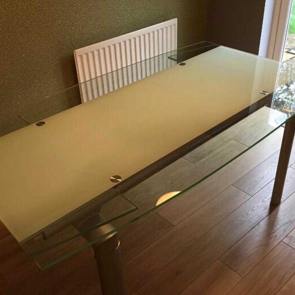 Glass extending dining table +4 leather chair in London Borough of