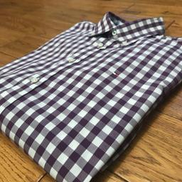 A smart white and purple ‘Ranger Check’ Tommy Hilfiger shirt. 

The shirt is a size Large and is a custom fit.

The shirts hosts it’s traditional Red/White/Blue logo on the left breast of the shirt.

The shirt is in fantastic condition. 8.5/10

Bargain £22.50

#TommyHilfiger