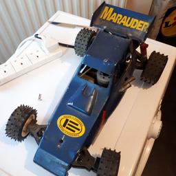 Mardave Marauder Vintage Nitro RC Car, sold as seen with spare parts also, needs repair and cleaning but parts included, controller also included.
