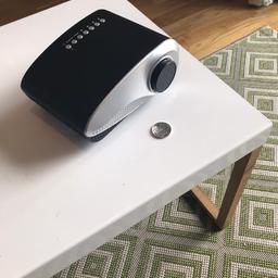 Mini Portable HD LED Projector Home Cinema Theater VGA AV HDMI SD. Perfect for connecting to smart hubs like chrome cast and gaming. Comes with original packing. Hardly used. Ask for any questions and price. For pick up only.