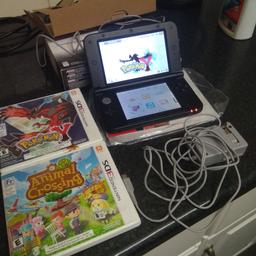 Nintendo 3DS XL and 2 games this is an American 3ds so will not play English D's games only American