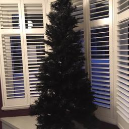 Large blue black 5 ft tree with stand. Easy to put up. Excellent condition. Collection only