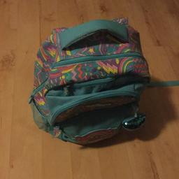 Multi colour Smiggle backpack with lots of pockets and zips