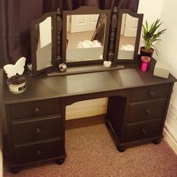Upcycled Matt Black dressing table complete with multi angled three panel mirror. Perfect as is or could be made more modern with new handles. Has six deep draws perfect for storage. 
Collection only.