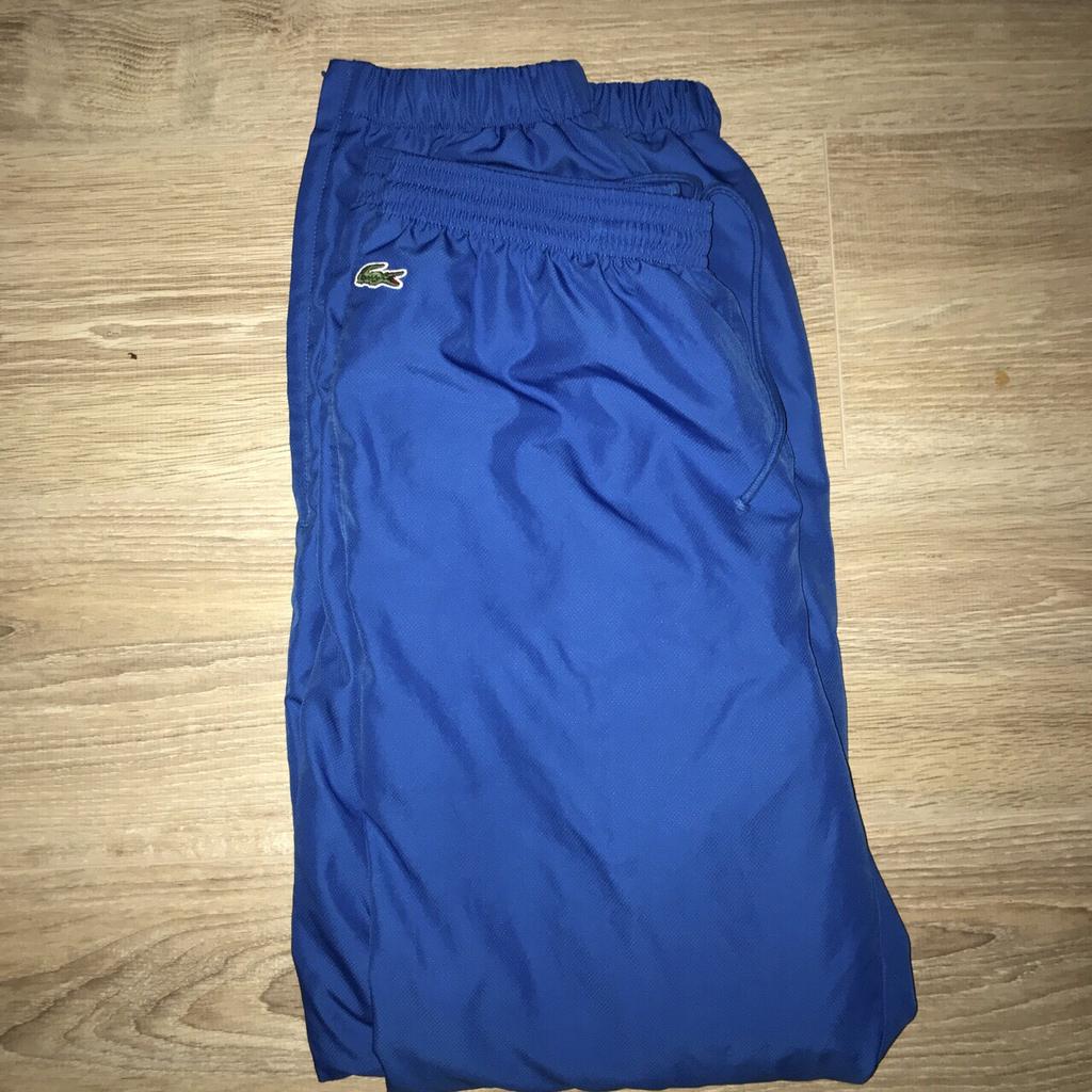 Red lacoste guppy pants hot sale