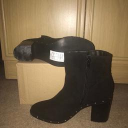 Suede. Studded gold studs detail around boots. Zip. Gorgeous boots. Brand new not even tried on. From smoke free pet free home.