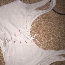 Topshop crop top in great condition only worn twice size 8 can fit a 6