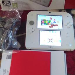 Nintendo 2ds in red and white in excellent condition bought last Christmas and only used a hand full of times comes with super Mario 3d land