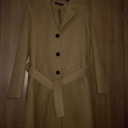 Vendo bellissimo cappotto con cinta  color cammello tg S .
Spedizione tramite corriere 8 euro
