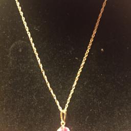 Ladies beautiful pink Ruby and 20inch gold chain, 10ct Genuine Ruby, beautiful n bling when worn. Only ever wore once, need to sell to save for my granddaughters nursery