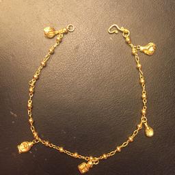 22k charm bracelet, 1 charm missing, safe to wear good weight, can't give correct weight at the moment due to misplaced weighing scales. Good bargain really looks beautiful when worn. No silly offers, collection only.