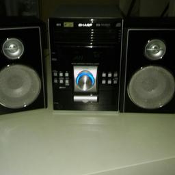 sharp 5 disc cd /radio with usb port 2 x speakers works fine no remote hence the price £15 ono collection only
