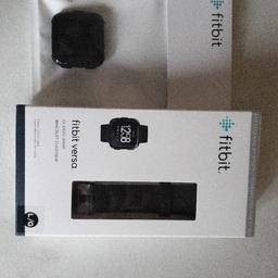 Brand new fitbit versa in black Large strap. please know this needs a charger £6 on Amazon. can deliver for small fee looking for a quick sale