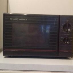 sharp carousel ll microwave in perfect condition pick up or can drop off local