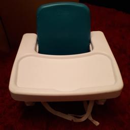 plastic portable high chair.  small strap missing.  can be replaced with something else.  comes apart to go in the dishwasher.  used condition.  few scratches shown in the picture
